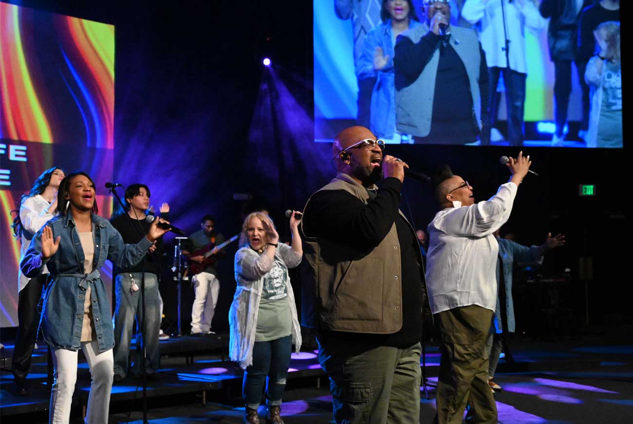 Pastors Curtis and Charmaine Bridgeman leading worship